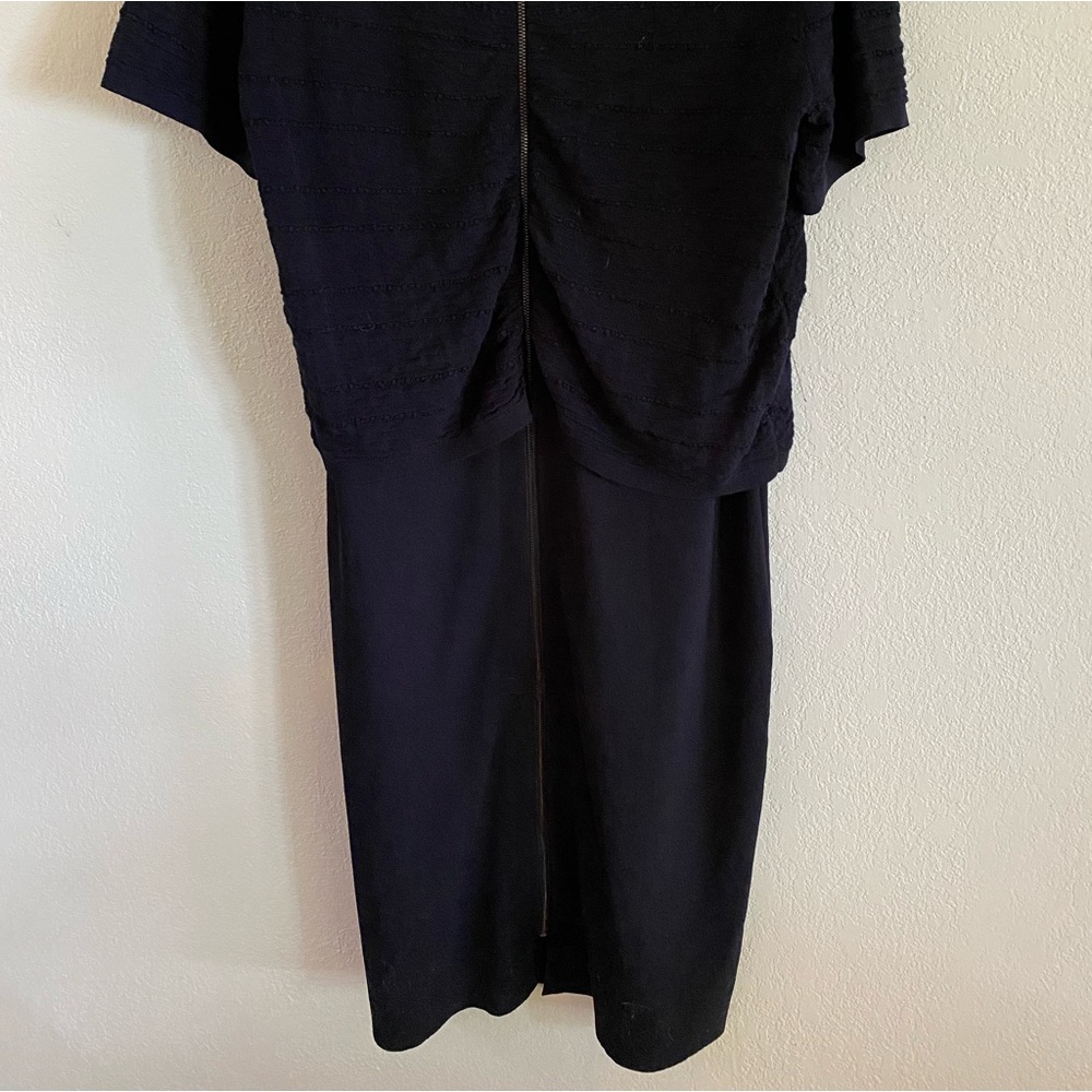 Woman’s dress size medium. Etcetera. Navy blue.